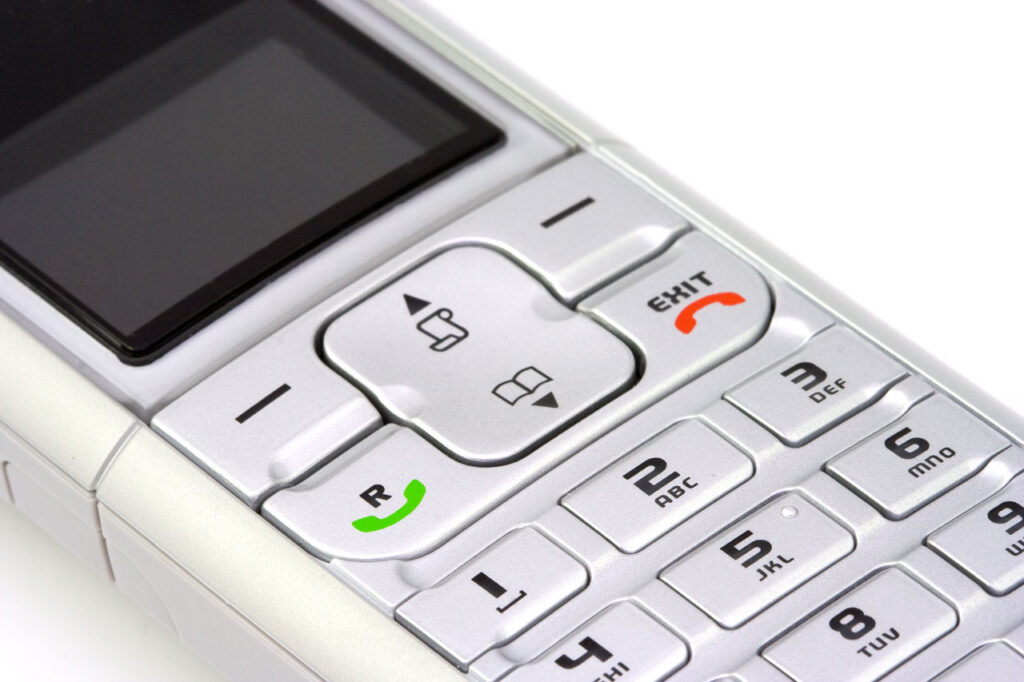 An older non-smart mobile phone.